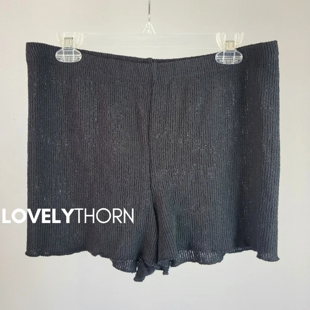 ZARA // black slightly frilled hem high elastic waist knit shorts